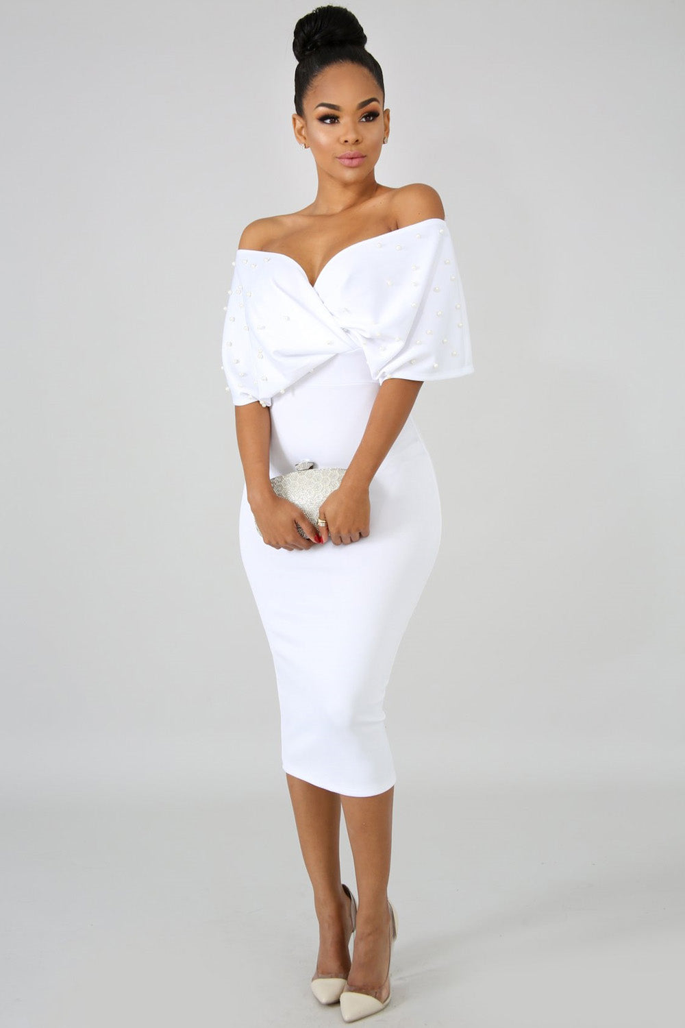 goPals fitted white midi length dress with off-the-shoulder neckline and large bow. 