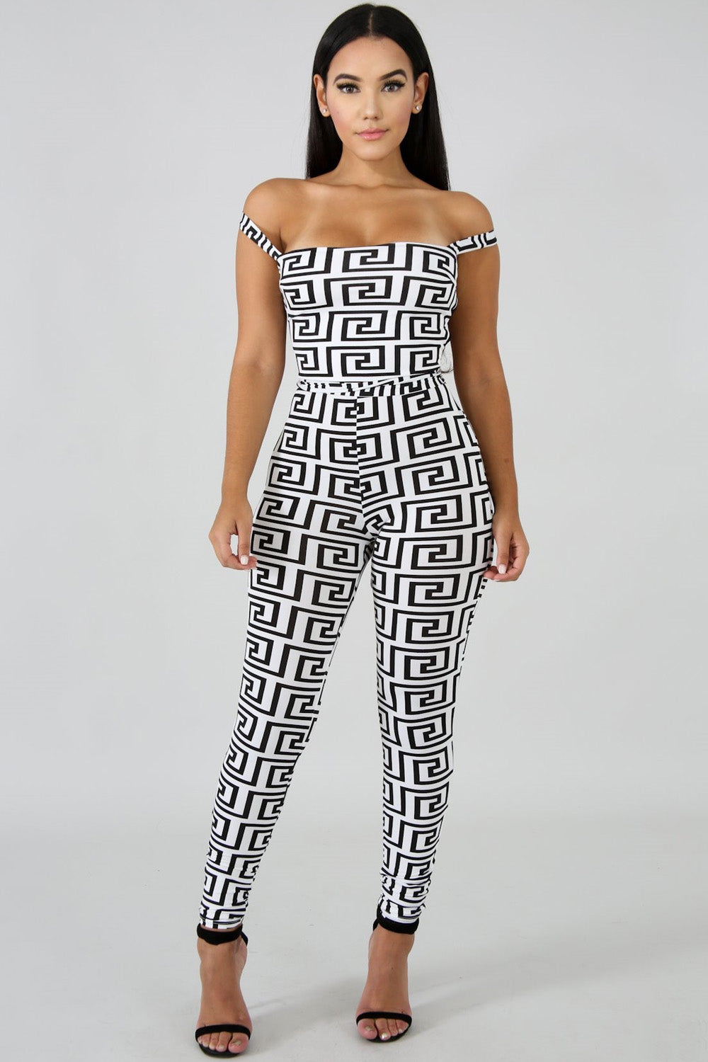 goPals skinny leg jumpsuit with geometric print and lace-up back. 